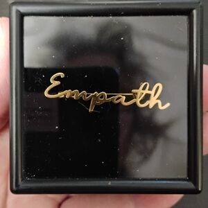 Custom Gold Tone EMPATH Brooch